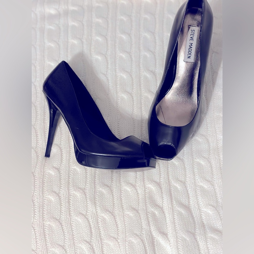 Black stiletto heels, about 5”